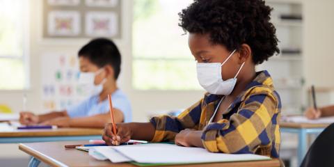 kids in class wearing masks